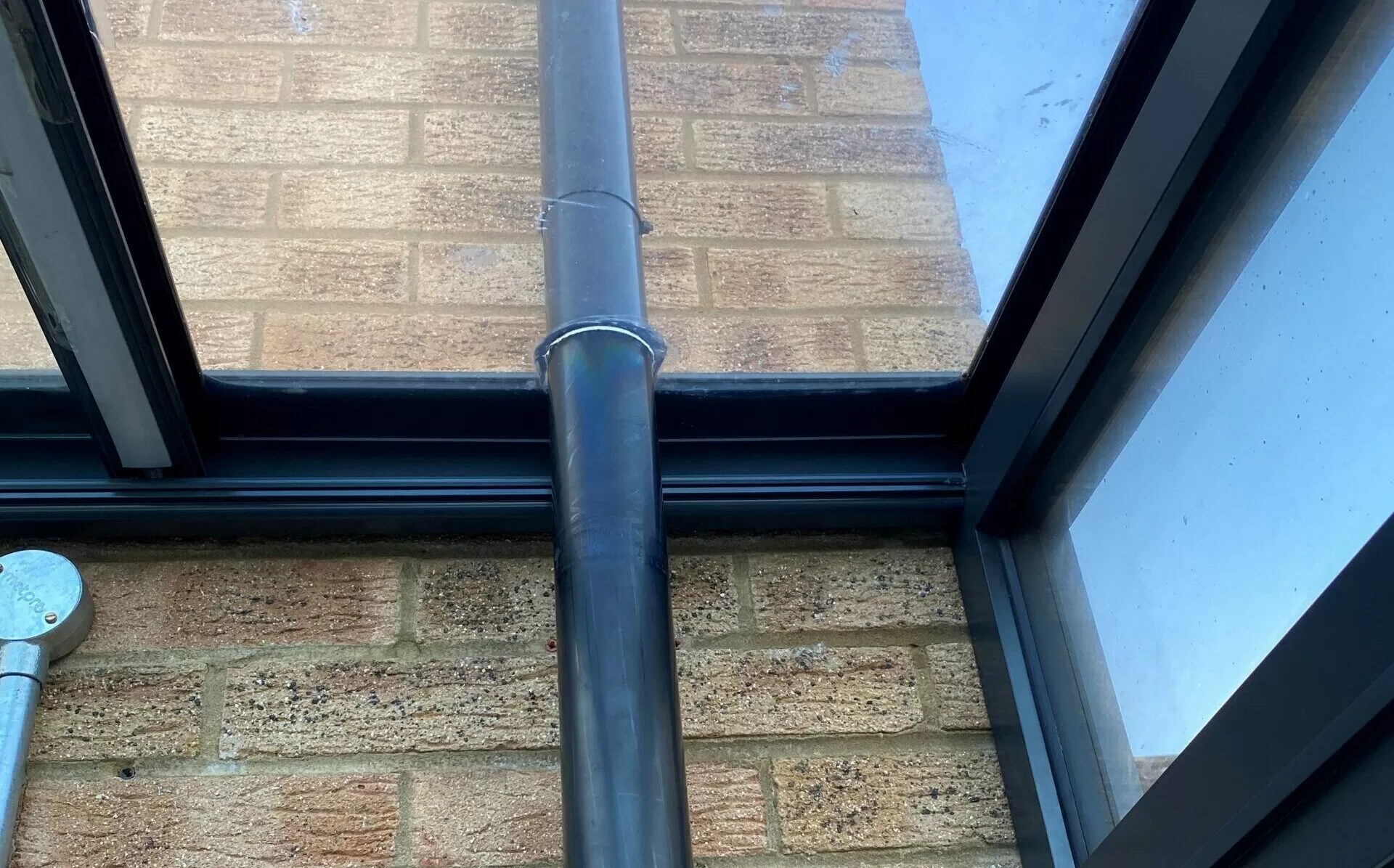 around-building-dowpipe-sealed